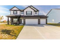 Two story home, 3-car garage, brick exterior at 10257 Meadow Path Ln, Indianapolis, IN 46239