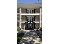 Three story brick building with balconies and awning at 4501 N Wheeling Ave # 7A-205, Muncie, IN 47304