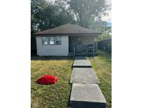 Charming one-story home with a well-maintained lawn at 2621 N Tacoma Ave, Indianapolis, IN 46218