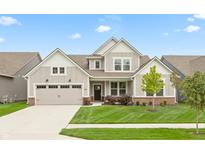 Two-story house with attached garage and manicured lawn at 750 Keck Way, Westfield, IN 46074