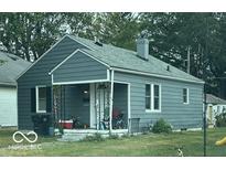 Gray house with a covered porch and small yard at 3410 Forest Ter, Anderson, IN 46013
