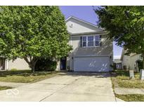 Two-story house with attached garage and landscaped yard at 2307 Blackthorn Dr, Franklin, IN 46131