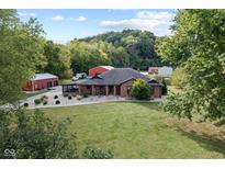 Ranch home with detached barn and large backyard at 4525 S Deck Rd, Gosport, IN 47433