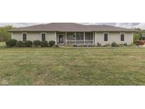 Ranch style home with covered porch and landscaping at 5391 Neff Ln, Mooresville, IN 46158