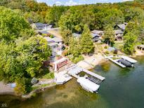 Lakefront property with private dock and beautiful landscaping at 4161 S Summit Ln, Columbus, IN 47201