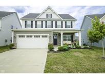 Two story home with a three car garage at 6390 Torrington St, Brownsburg, IN 46112