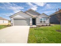 Two-story home with gray siding and attached garage at 1114 Fleming Dr, Greenfield, IN 46140