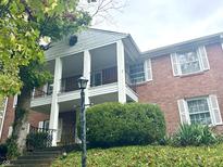 Brick house exterior with columns and balcony at 7722 Shady Hills W Dr, Indianapolis, IN 46278