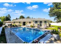 Inviting in-ground pool with ample patio space for lounging at 3005 Olive Branch Rd, Greenwood, IN 46143