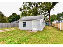 Small house with gray siding and a front yard at 214 Tippecanoe Dr, Noblesville, IN 46062