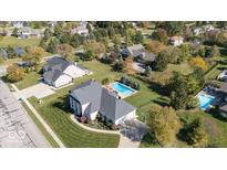 Aerial view of property showing house and pool at 1957 Cherry Tree Rd, Avon, IN 46123