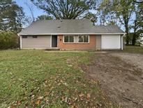 House exterior features brick and siding at 4343 N Arlington Ave, Indianapolis, IN 46226