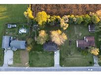 Aerial view of multiple houses and properties with surrounding land at 3837 W State Road 32 W W, Westfield, IN 46074