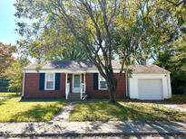 Brick ranch home with attached garage at 5160 Atherton S Dr, Indianapolis, IN 46219