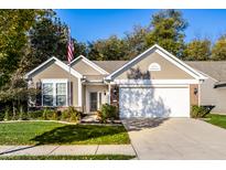Beautiful ranch home with landscaping and attached garage at 12786 Bardolino Dr, Fishers, IN 46037