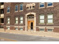Brick apartment building with ornate entryway at 108 E St Clair St # B, Indianapolis, IN 46204