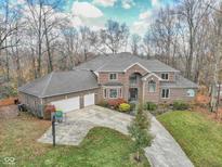 Two-story home with attached two-car garage and large backyard at 808 Copperfield Xing, Danville, IN 46122