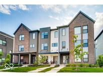 Modern three-story townhouses with front porches at 1817 N New Jersey St, Indianapolis, IN 46202