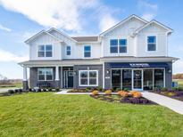 Two story home with gray brick and white siding at 236 Sam Himsel Way, Danville, IN 46122