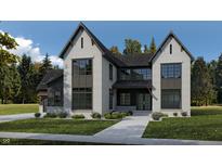 Stunning two-story home with gray and white exterior, a covered porch, and landscaping at 11135 Hamilton Run (Proposed Construction), Zionsville, IN 46077