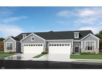 Gray three-car garage home with white accents and landscaping at 1621 Clover Crossing Dr, Greenfield, IN 46140