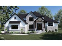 Stunning two-story home with stone accents and a welcoming front porch at 8030 Totton Ct, Zionsville, IN 46077
