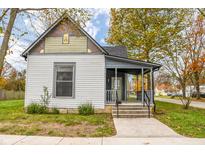 Quaint craftsman home with a covered porch and well-manicured lawn at 700 S Ohio St, Sheridan, IN 46069
