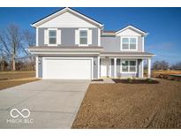 Two story gray house with white accents and a two car garage at 6712 Firkins Dr, Indianapolis, IN 46221