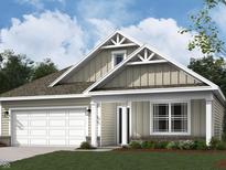 One-story craftsman style home with neutral siding and a two-car garage at 107 Marble Wood Dr, Danville, IN 46122