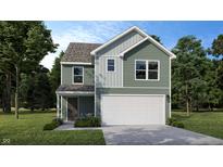 Two-story house with green siding, white garage door, and landscaping at 1126 Lona Dr, Martinsville, IN 46151