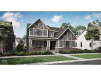 Two-story home with gray siding, brick accents, and a landscaped front yard at 1490 Chatham Village Blvd, Westfield, IN 46074