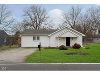 White house with a green lawn and a black mailbox at 5612 Hardegan St, Indianapolis, IN 46227