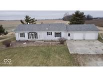 Aerial view of ranch home, detached garage, and expansive yard at 4726 E 210 N, Lebanon, IN 46052