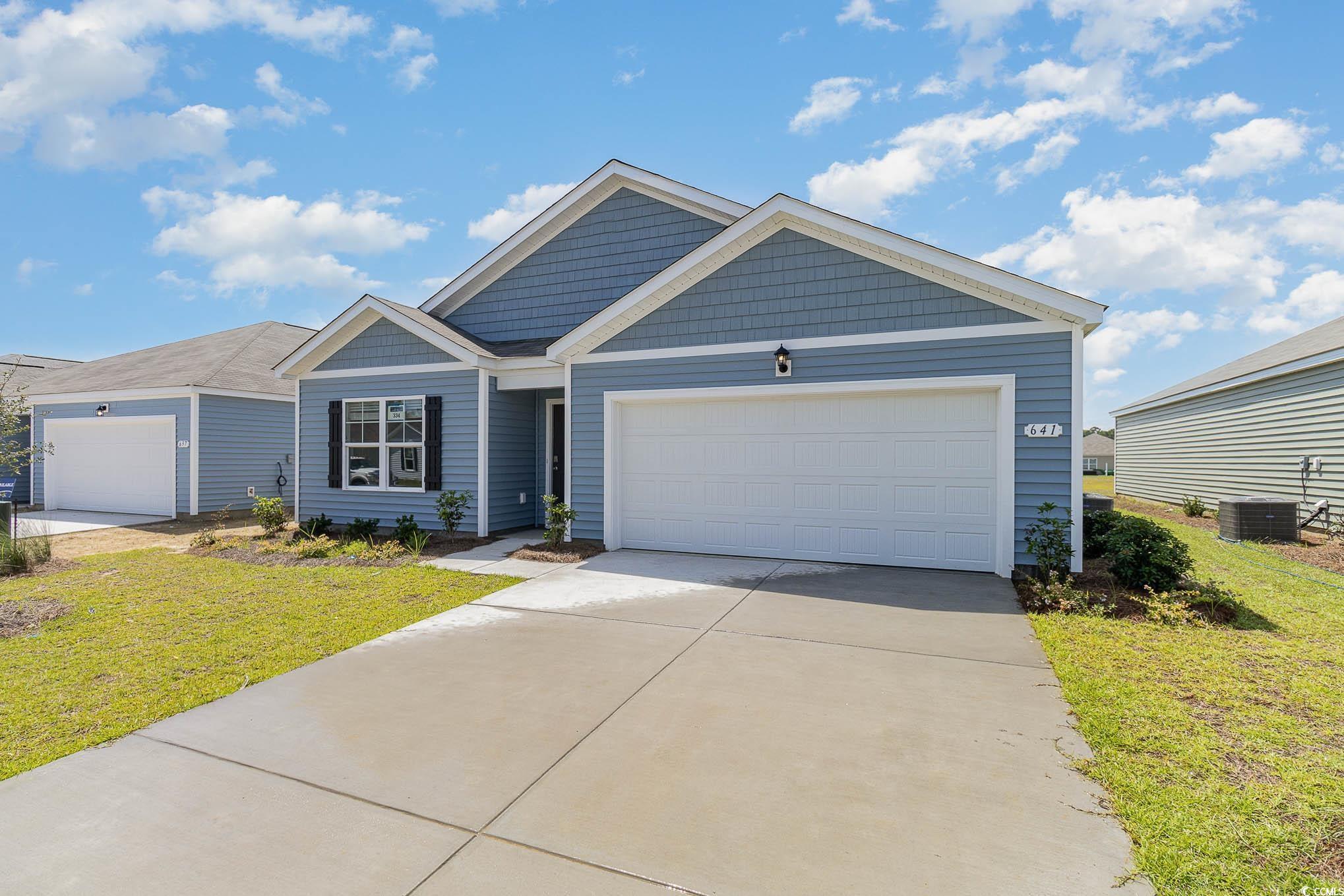 Photo one of 4524 East Coast Ln. Shallotte NC 28470 | MLS 2409938