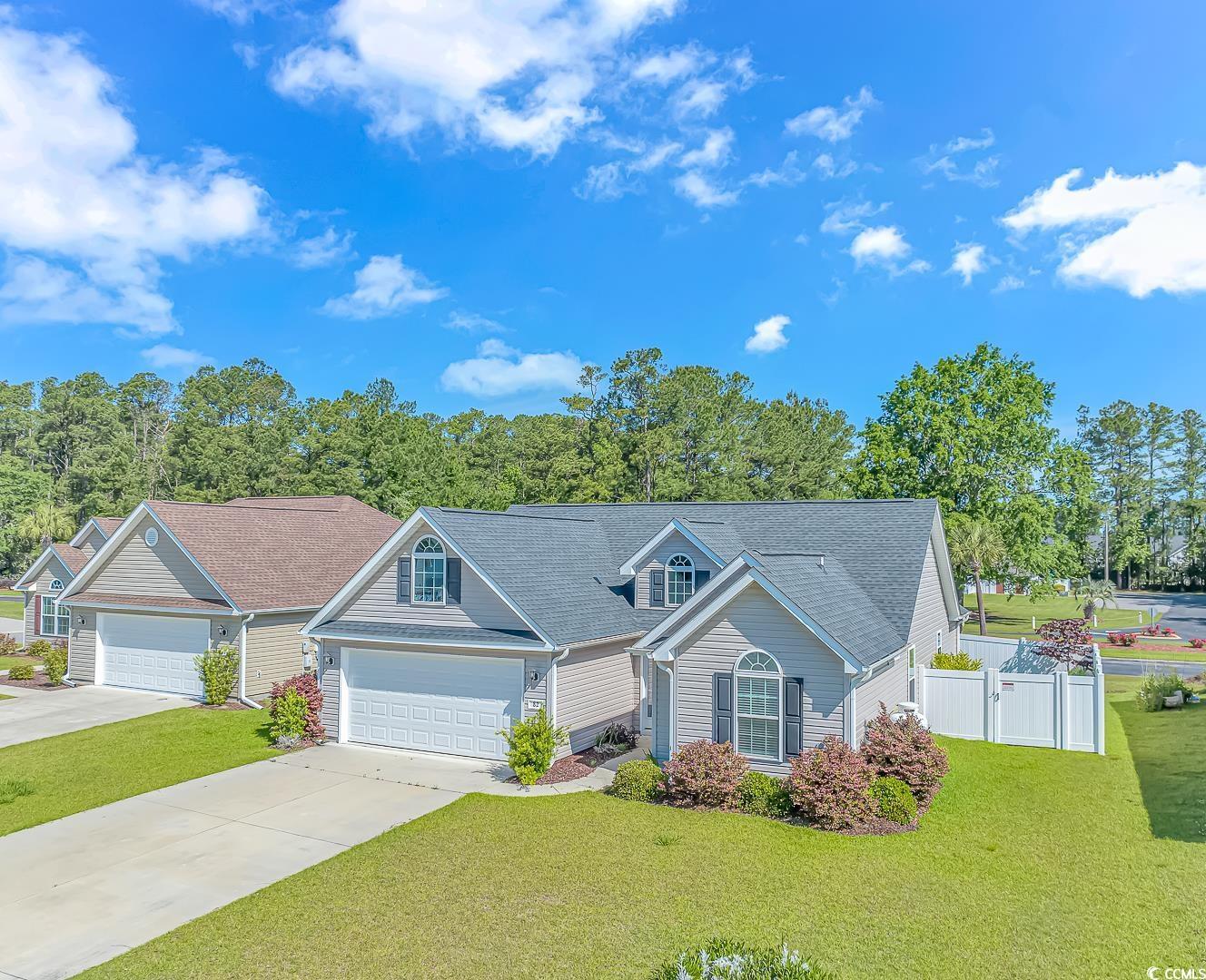Photo one of 82 Palmetto Green Dr. Longs SC 29568 | MLS 2410055