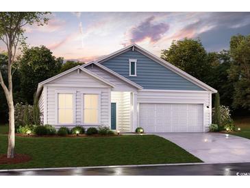 Charming two-story home with a white and blue exterior, two-car garage, and landscaping at Tbd2 Kapalua Loop, Little River, SC 29566