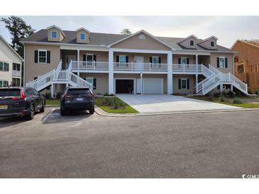 Photo one of 1147 Freeboard St. # 101 Murrells Inlet SC 29576 | MLS 2309537