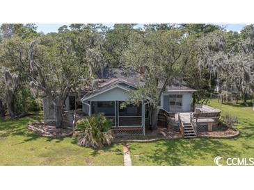 Photo one of 204 Whippoorwill Dr. Pawleys Island SC 29585 | MLS 2313659