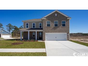 Photo one of 3219 Sutherland Dr. Little River SC 29566 | MLS 2324990