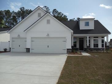 Photo one of 8835 Baton Rouge Ave Nw Calabash NC 28467 | MLS 2325383