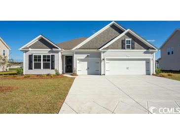 Photo one of 3179 Sutherland Dr. Little River SC 29566 | MLS 2401300