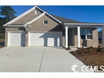 Photo one of 3171 Sutherland Dr. Little River SC 29566 | MLS 2401837