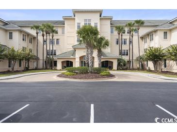Attractive building exterior with palm trees and ample parking at 2180 Waterview Dr. # 837, North Myrtle Beach, SC 29582