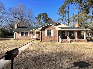 Photo one of 219 E Marion St. Mullins SC 29574 | MLS 2404711