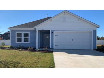 Charming one-story home with blue siding and a two-car garage at 3051 Deerberry Place, Longs, SC 29568