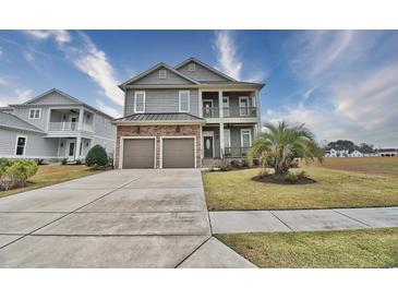 Two-story house with two-car garage at 202 Palmetto Harbour Dr., North Myrtle Beach, NC 29582