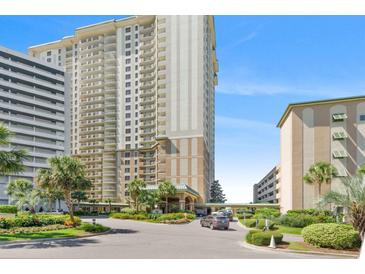 Luxury high-rise building with ample parking and landscaping at 9994 Beach Club Dr. # 703, Myrtle Beach, SC 29572