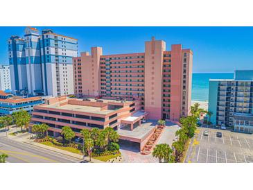 Oceanfront building with parking and surrounding buildings at 2207 S Ocean Blvd. # 414, Myrtle Beach, SC 29577