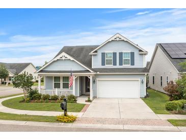 Two-story house with gray siding, white trim, and a two-car garage at 1433 Beaumont Way, Myrtle Beach, SC 29577