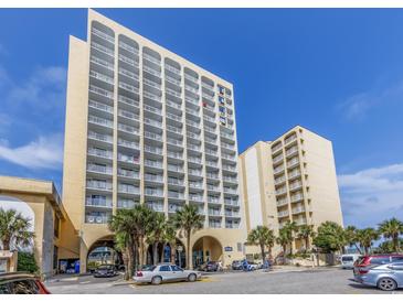 Oceanfront high rise building with parking and palm trees at `1207 S Ocean Blvd. # 51512, Myrtle Beach, SC 29577